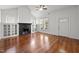 Bright living room with hardwood floors, a decorative fireplace, and plenty of natural light at 708 Parker St, Durham, NC 27701