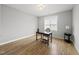 Office space offers hardwood floors, a ceiling fan, and neutral paint scheme at 733 Daniel Ridge Rd, Wendell, NC 27591