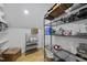 Organized pantry with metal shelving and ample storage space at 733 Daniel Ridge Rd, Wendell, NC 27591