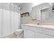 Clean and classic bathroom featuring white fixtures, a shower with curtain and a vanity at 741 Rockville Rd, Wake Forest, NC 27587