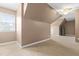 Bedroom with neutral carpet, angled ceilings, a ceiling fan, and a storage area at 741 Rockville Rd, Wake Forest, NC 27587