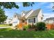 A charming home with a well-kept lawn and landscaping, featuring a cozy front porch and inviting curb appeal at 741 Rockville Rd, Wake Forest, NC 27587