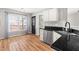Lovely kitchen with granite counters, stainless steel appliances, and a window at 741 Rockville Rd, Wake Forest, NC 27587