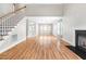 Open-concept living space seamlessly connects to the dining area, creating an ideal space for entertaining at 741 Rockville Rd, Wake Forest, NC 27587