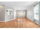 Inviting living room featuring an open floor plan with large windows and bright lighting at 741 Rockville Rd, Wake Forest, NC 27587