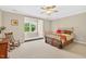 Comfortable bedroom with a window seat and classic furnishings at 8851 Mariner Dr, Raleigh, NC 27615