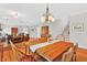Open-concept design showcasing the dining room, living room and staircase for seamless living at 8851 Mariner Dr, Raleigh, NC 27615