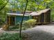 A charming home with a screened-in porch and a gravel driveway at 9709 Greenfield Rd, Chapel Hill, NC 27516