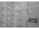 Spacious walk-in pantry with wall-mounted, wire shelving for optimized storage at 9709 Greenfield Rd, Chapel Hill, NC 27516
