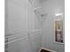 Spacious walk-in closet with wire shelving for optimal organization and storage space, as well as a mirror on the wall at 9709 Greenfield Rd, Chapel Hill, NC 27516