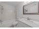 Well-maintained bathroom with a tub-shower combo, ceramic tile, and a white marble vanity at 1010 Nicholwood Dr # 301, Raleigh, NC 27605