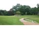 Lush green park featuring trees, pathways, and landscaping at 1010 Nicholwood Dr # 301, Raleigh, NC 27605