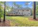 Expansive backyard featuring a large wooden deck, perfect for outdoor entertaining and relaxation at 105 Bathgate Ln, Cary, NC 27513