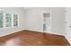 Bedroom with window and doorway to bathroom at 105 Bathgate Ln, Cary, NC 27513