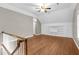 Bonus room with hardwood floors and built in shelves at 105 Bathgate Ln, Cary, NC 27513