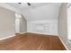 Bonus room with hardwood floors and built in shelves at 105 Bathgate Ln, Cary, NC 27513