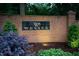 Brick community sign for 'Wessex' with well-maintained landscaping and an elegant design at 105 Bathgate Ln, Cary, NC 27513
