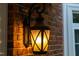 Close-up of an elegant outdoor lantern fixture, enhancing the home's exterior charm at 105 Bathgate Ln, Cary, NC 27513