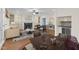 Elegant living room featuring a fireplace, built-in shelving, and stylish furnishings at 105 Bathgate Ln, Cary, NC 27513