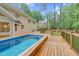 Beautiful pool and wooden deck create an inviting outdoor space for relaxation and entertainment at 105 Bathgate Ln, Cary, NC 27513