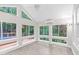 Light-filled sunroom with many windows and natural views at 105 Bathgate Ln, Cary, NC 27513