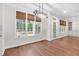 Sunroom with ample natural light, a view of the hot tub and access to the outdoors at 105 Bathgate Ln, Cary, NC 27513