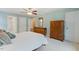 A bedroom with an ensuite bathroom and closet space combines comfort and convenience at 105 Windfall Ct, Cary, NC 27518