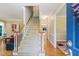 Open entryway with hardwood floors and staircase leading to the second floor at 105 Windfall Ct, Cary, NC 27518