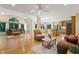 Open living area seamlessly connects the living room, dining space, and modern kitchen at 105 Windfall Ct, Cary, NC 27518