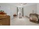 Bright Bedroom featuring ceiling fan, cozy rocker, and a crib at 10721 Marabou Ct, Raleigh, NC 27614