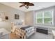 Bright bedroom featuring a window seat and an area for comfort and convenience at 108 Market Cross Ct, Holly Springs, NC 27540