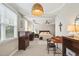 Bright ensuite sitting area adjacent to the main bedroom for relaxation and convenience at 108 Market Cross Ct, Holly Springs, NC 27540