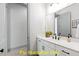 Modern bathroom with white cabinets, black hardware and a vessel sink at 110 Broadleaf Ln, Louisburg, NC 27549