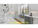 Kitchen featuring white cabinets, stainless steel appliances, quartz countertops, and a farmhouse sink at 110 Broadleaf Ln, Louisburg, NC 27549