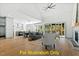 Open concept living space with a fireplace and access to the kitchen at 110 Broadleaf Ln, Louisburg, NC 27549
