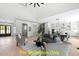 Spacious open-concept living room with hardwood floors and modern finishes at 110 Broadleaf Ln, Louisburg, NC 27549