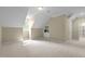 Large bonus room includes bright light, dormer windows, neutral colors and built-ins at 12201 Lockhart Ln, Raleigh, NC 27614