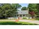 Charming home with white picket fence and brick driveway at 12201 Lockhart Ln, Raleigh, NC 27614