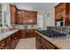 Well-equipped kitchen with custom cabinets and granite counters at 12201 Lockhart Ln, Raleigh, NC 27614