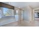 This full bathroom has a white tub, glass enclosed shower, and is naturally bright at 124 Seagraves Creek Ln, Holly Springs, NC 27540