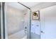 Cozy bathroom featuring a tub/shower combination with stylish curtain and modern fixtures at 124 Seagraves Creek Ln, Holly Springs, NC 27540