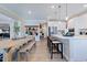 Spacious eat-in kitchen with stainless steel appliances, a large center island, and ample counter space at 124 Seagraves Creek Ln, Holly Springs, NC 27540