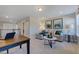 This upstairs living room is bright with a couch and decorative elements at 124 Seagraves Creek Ln, Holly Springs, NC 27540