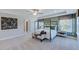 This spacious main bedroom features a tray ceiling, ceiling fan, canopy bed, and carpet at 124 Seagraves Creek Ln, Holly Springs, NC 27540