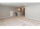 Finished basement with carpet flooring and recessed lighting provides ample space for entertainment and recreation at 12421 Angel Vale Pl, Durham, NC 27703