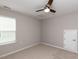 An airy bedroom with natural light, plush carpeting and recessed lighting is ready for your personal touches at 12421 Angel Vale Pl, Durham, NC 27703