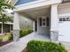 Front entrance featuring stone pillars and a covered entryway at 12421 Angel Vale Pl, Durham, NC 27703