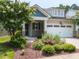 Charming home featuring an attached two car garage and meticulously landscaped front yard at 12421 Angel Vale Pl, Durham, NC 27703