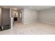 Spacious room with neutral walls and carpet, offering a versatile area for relaxation and entertainment at 12421 Angel Vale Pl, Durham, NC 27703