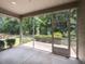 The spacious screened porch overlooks a lush, green backyard at 12421 Angel Vale Pl, Durham, NC 27703